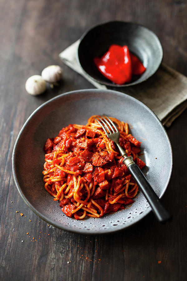 Spaghetti All Amatriciana With Chorizo, Chilli And Preserved Peppers Photograph by Jan Wischnewski