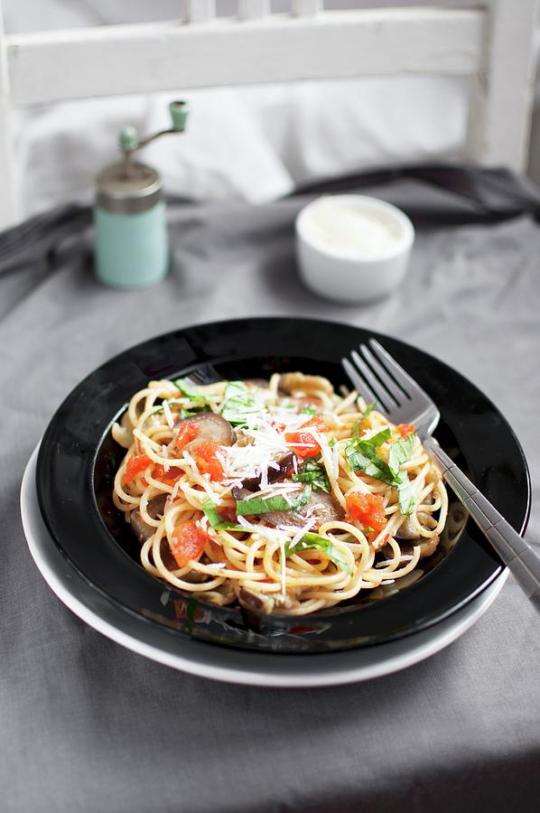 Spaghetti Alla Norma With Tomatoes, Aubergine, Grated Parmesan And Basil Photograph by Kachel Katarzyna