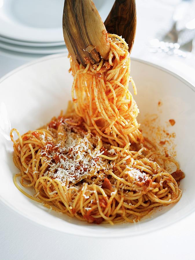 Spaghetti Amatriciana With Parmesan Cheese Photograph by Bill Kingston
