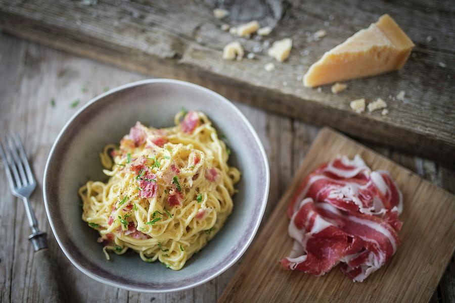 Spaghetti Carbonara With Coppa Ham And Parmesan Photograph by Jan Wischnewski