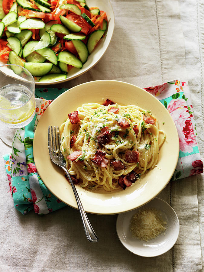 Spaghetti Carbonara With Tomato And Cucumber Salad Photograph by Karen Thomas