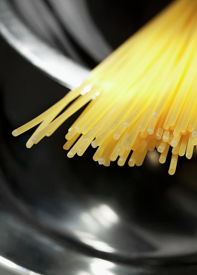 Spaghetti In A Pan close-up Photograph by Pawel Worytko