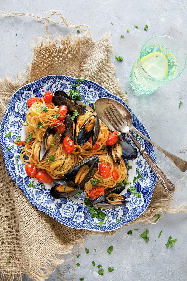 Spaghetti Vongole With Cherry Tomatoes Photograph by Aniko Takacs