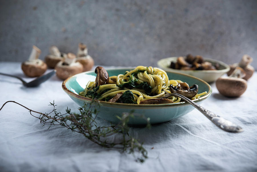 Spaghetti With Coconut And Spinach Sauce And Brown Mushrooms vegan Photograph by Kati Neudert