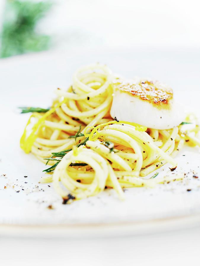 Spaghetti With Cod, Rosemary And Lemon Photograph by Martin Dyrlv