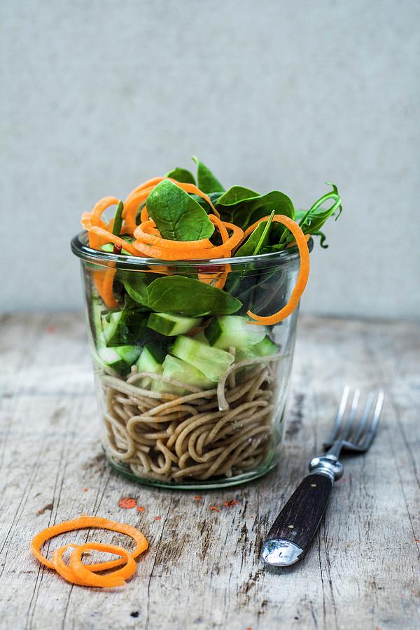 Spaghetti With Cucumber And Spinach In A Glass Photograph by Leah Bethmann