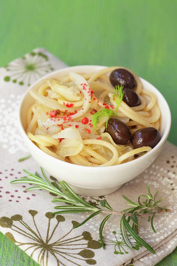 Spaghetti With Fennel, Olives, Pink Pepper And Rosemary Photograph by Hilde Mche