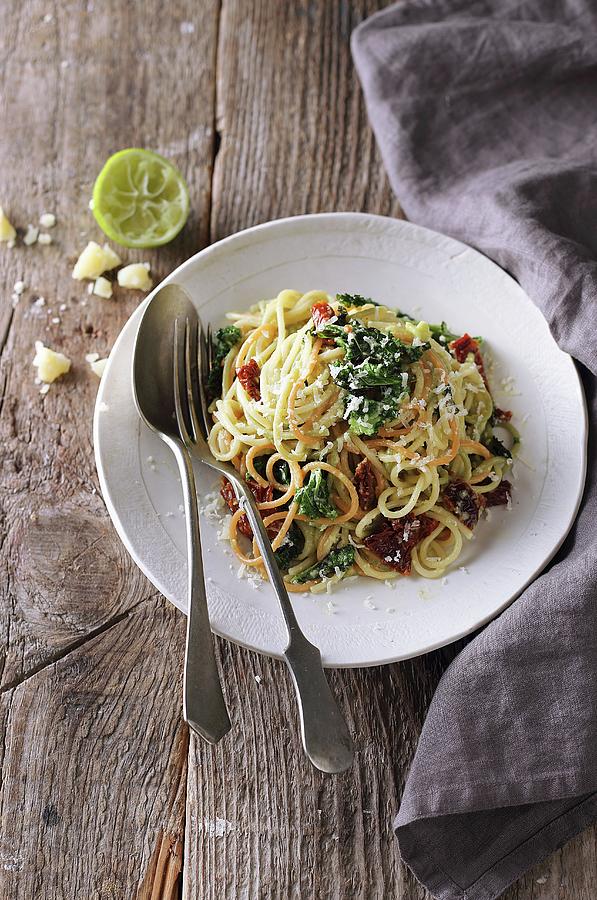 Spaghetti With Mashed Avocado, Dried Tomatoes, And Kale Photograph by Zita Csig