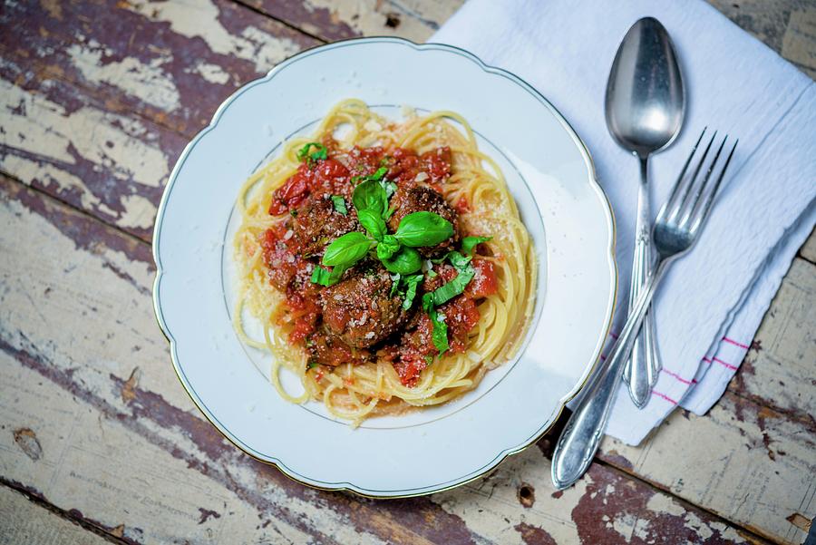 Spaghetti With Meatballs And Tomato Sauce Photograph by Sebastian