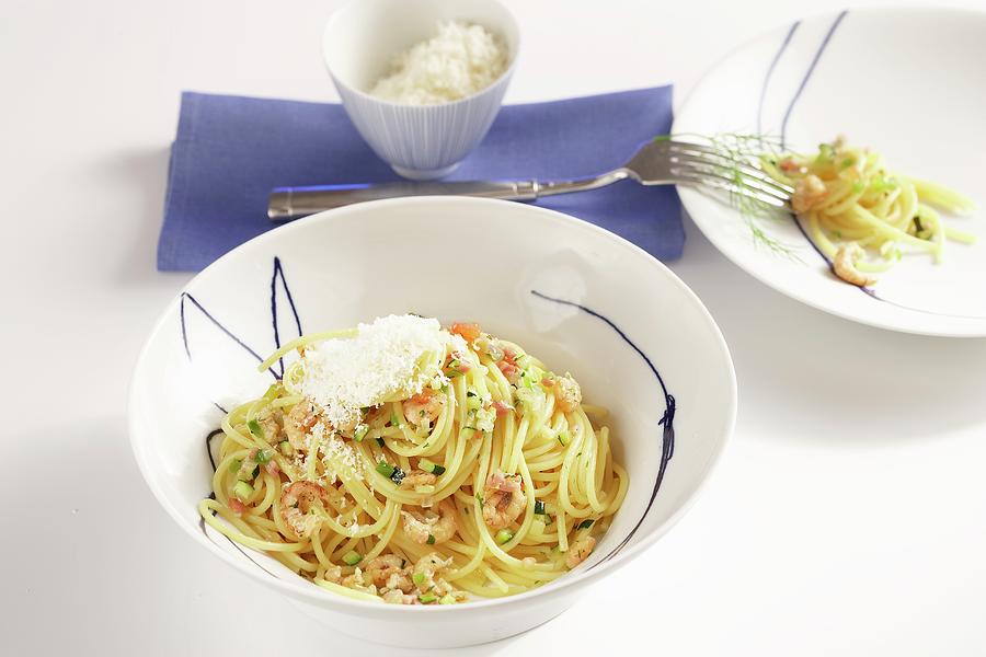Spaghetti With Shrimp Ragout And Parmesan Cheese Photograph by Teubner Foodfoto