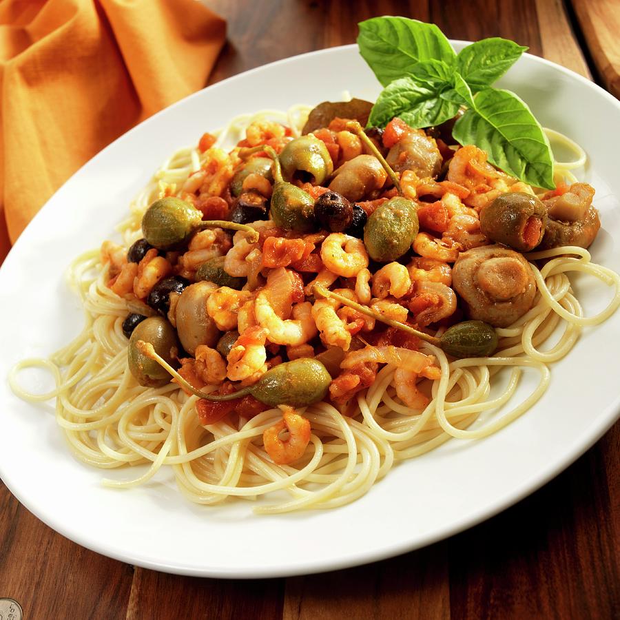 Spaghetti With Tiny Shrimps, Olives, Capers, Garlic And Mushrooms sicily Photograph by Paul Poplis