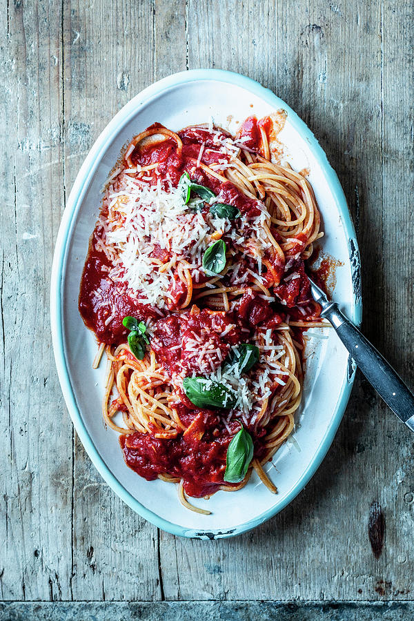 Spaghetti With White Wine, Tomato Sauce And Parmesan Cheese Photograph by Simone Neufing