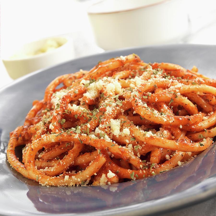 Spaghettoni Pasta In A Marinara Sauce With Parmesan Cheese And Herbs Photograph by Paul Poplis