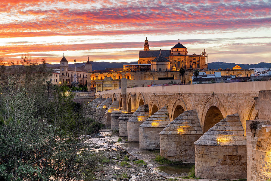 Spain, Andalusia, Cordoba District, Cordoba, La Mezquita Cathedral, Roman Bridge At Sunset Digital Art by Stefano Politi Markovina