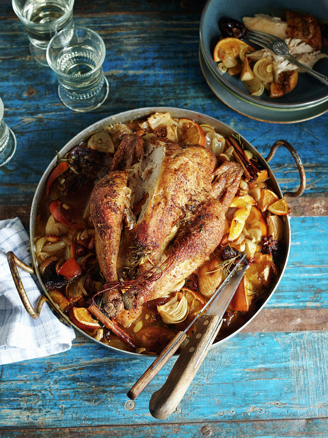 Spanish Chicken On A Bed Of Oranges, Onions And Dried Fruit Photograph by Oliver Brachat