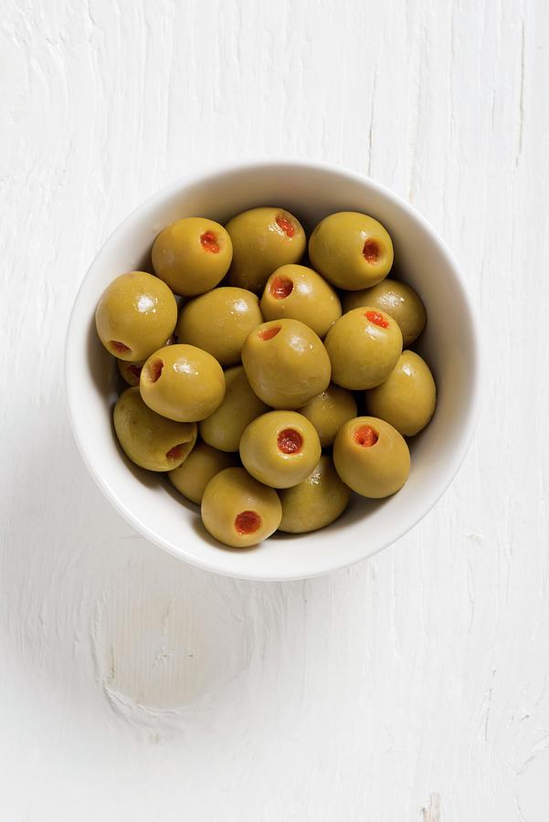 Spanish Olives Filled With Peppers Photograph by Franco Pizzochero
