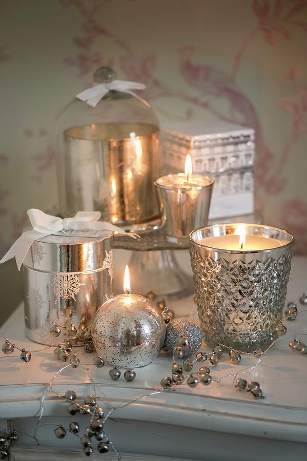 Sparkling Silver Arrangement Of Candles, Tealight Holders And Silvered Glass Photograph by Winfried Heinze