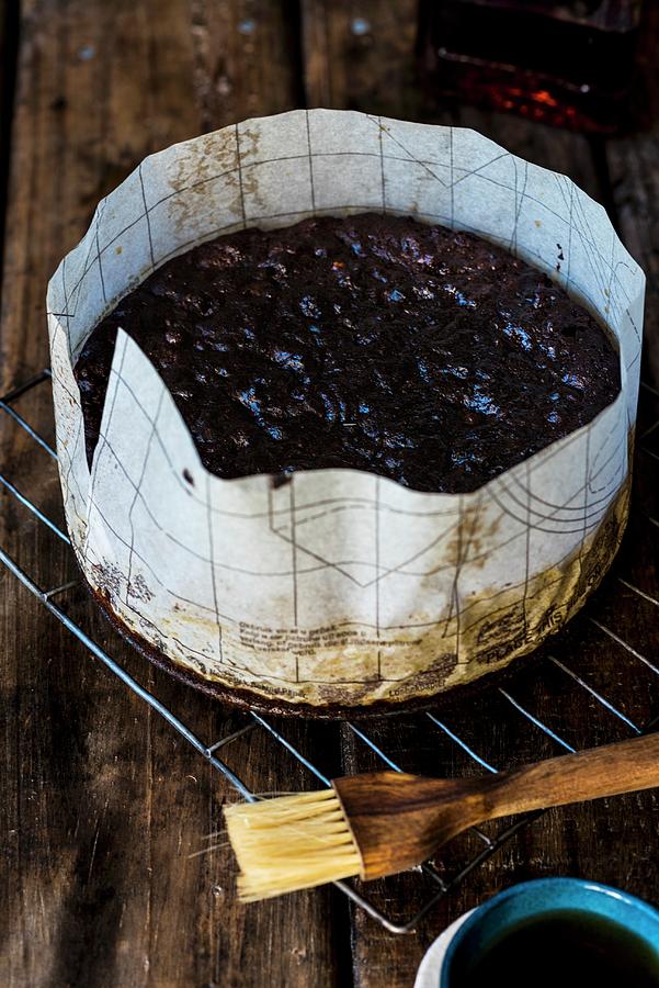 Spelt, Amaretto And Fruit Cake In A Baking Tin Photograph by Hein Van Tonder