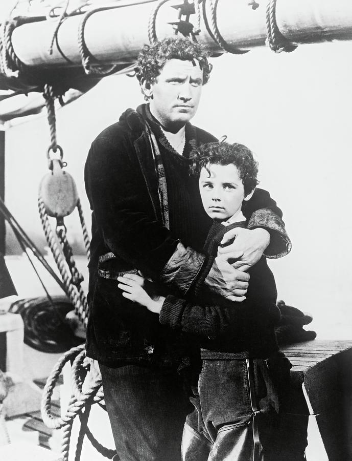 SPENCER TRACY and FREDDIE BARTHOLOMEW in CAPTAINS COURAGEOUS -1937-. Photograph by Album