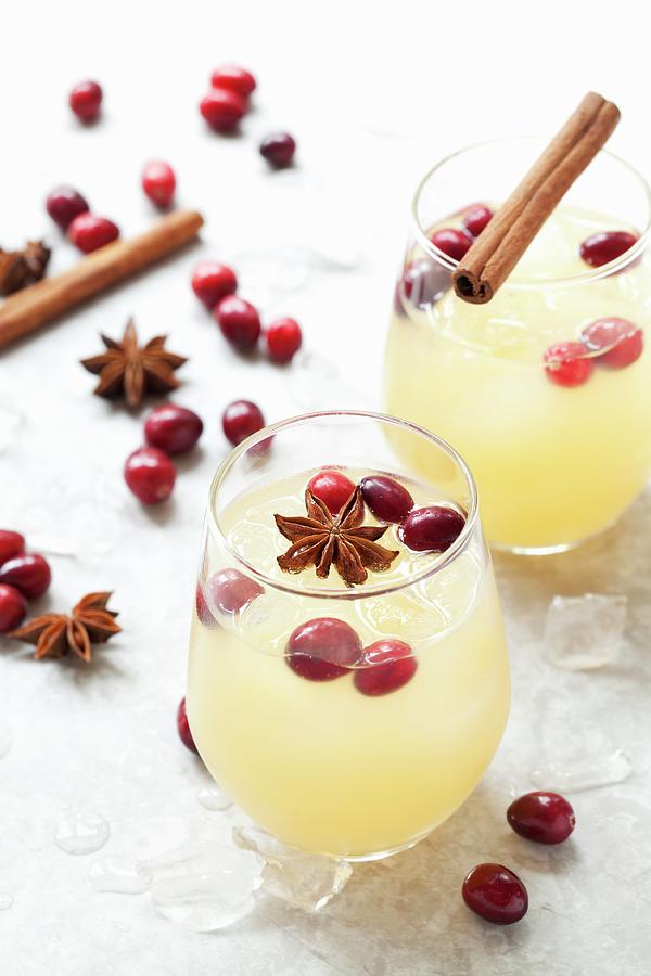 Spiced Apple Juice With Cranberries Photograph by Jane Saunders