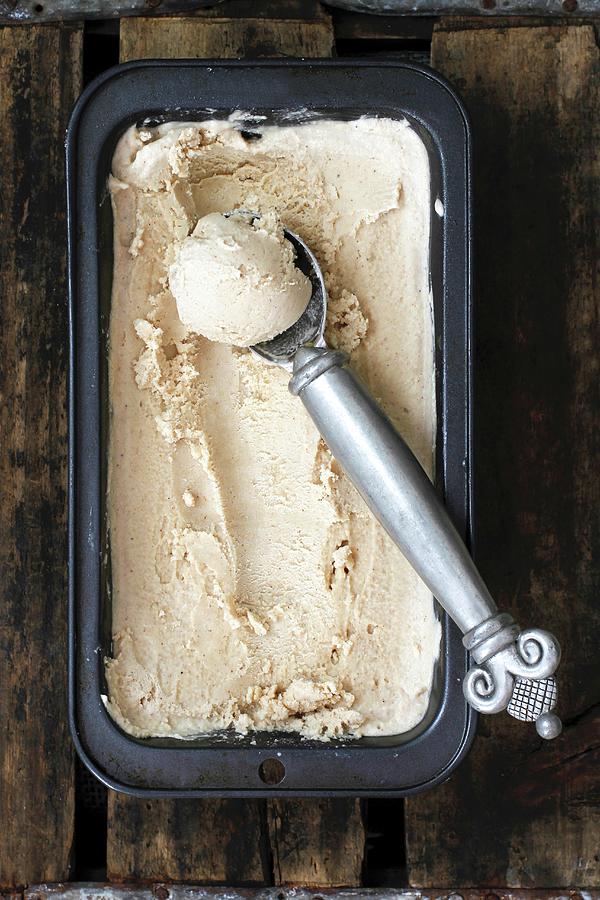 Spiced Chai Ice Cream With A Scoop Photograph by Ev Thomas