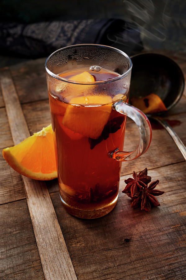 Spiced Cider With An Orange Slice And Star Anise Photograph by Stefan Schulte-ladbeck