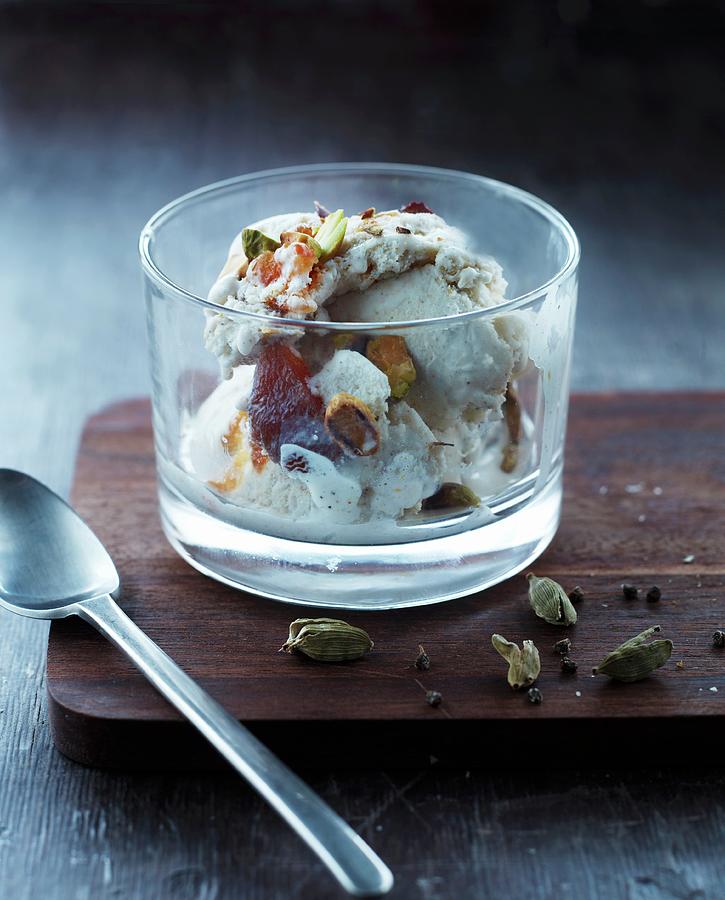 Spiced Ice Cream With Pistachio Nuts Photograph by Lars Ranek