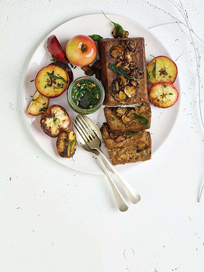 Spiced Pecan Nut And Mushroom Bread With Fried Sage Apples And Basil Pesto For Christmas Photograph by Great Stock!