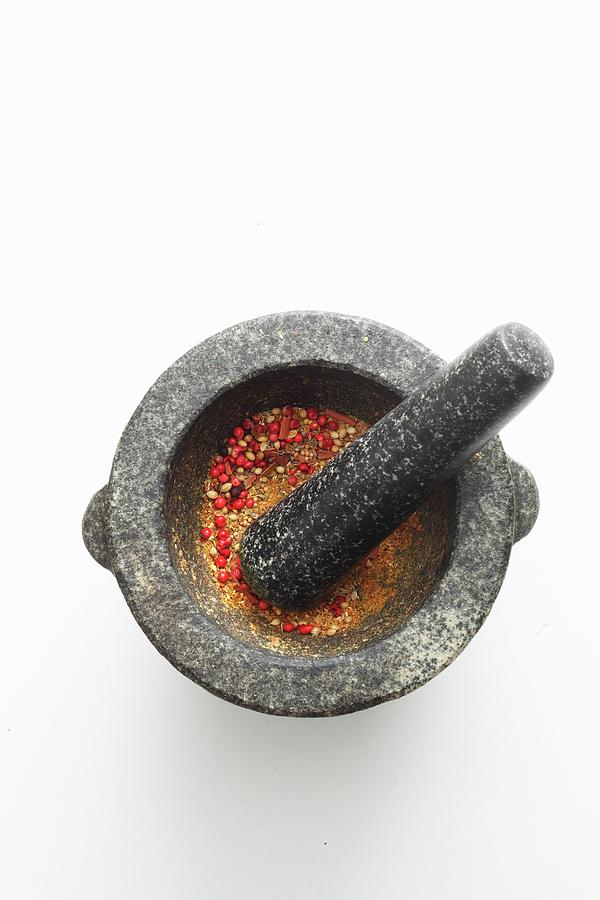 Spices In Mortar With Pestle Photograph by Jalag / Mathias Neubauer