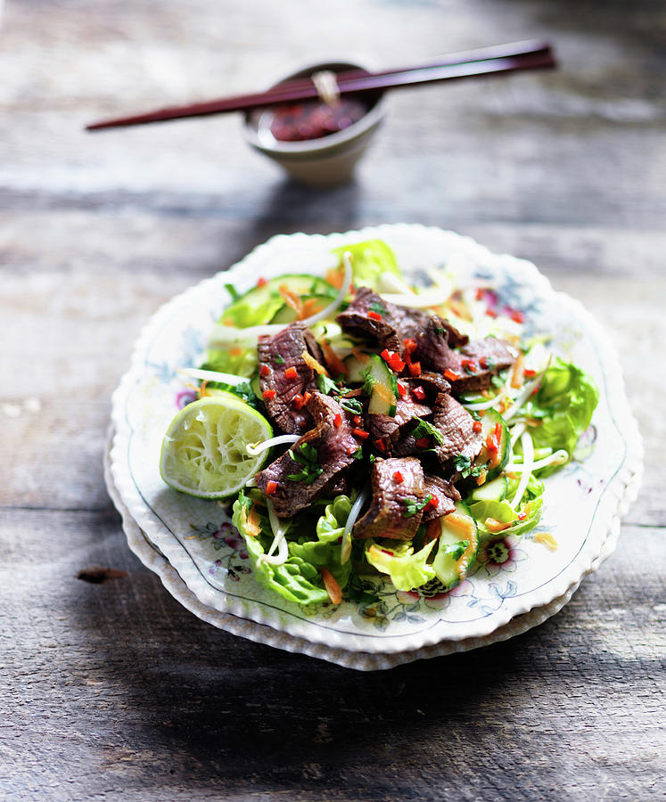 Spicy Beef Salad With Lime, Chilli, Cucumber And Lettuce Photograph by Karen Thomas