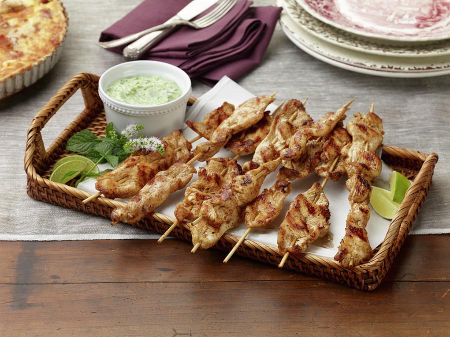Spicy Cajun Chicken Skewers With A Herb Dip Photograph by Rene Comet