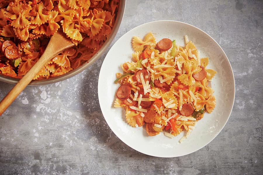 Spicy Cajun Pasta Made With Andouille Sausage, Tomatoes And Cheese Photograph by Greg Rannells