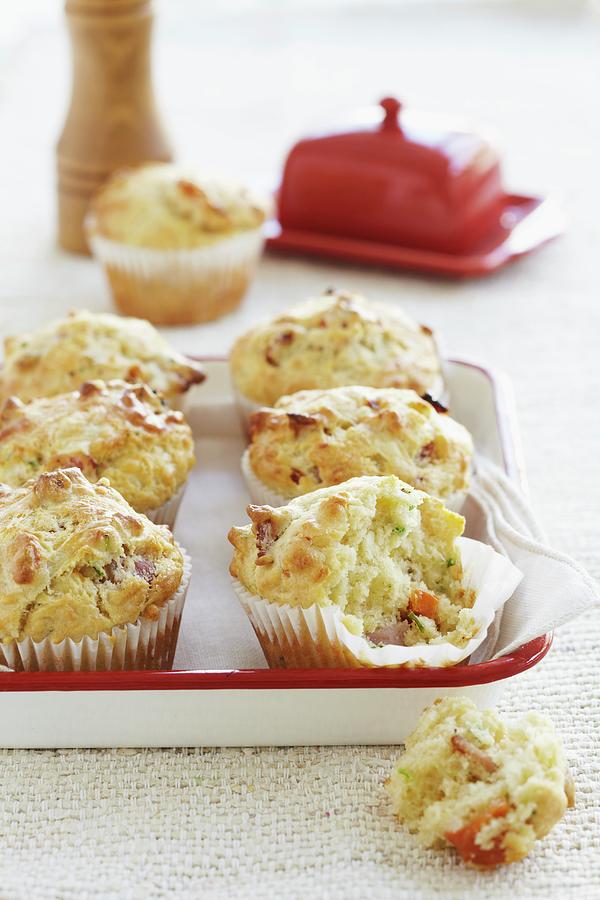 Spicy Carrot And Courgette Muffins Photograph by Charlotte Tolhurst