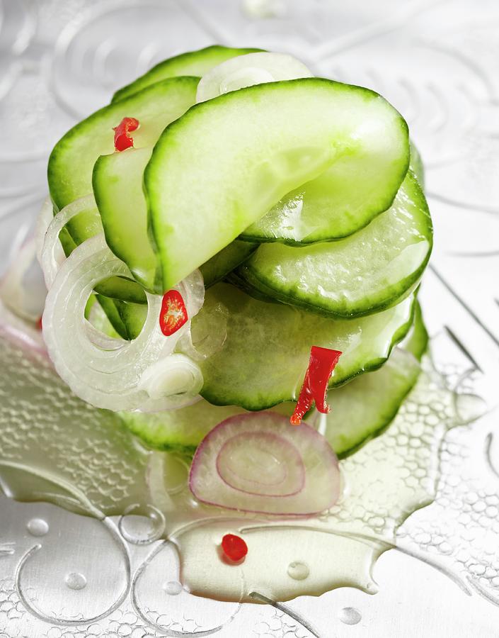 Spicy Cucumber Salad With Onions And Chilli Peppers Photograph by Teubner Foodfoto