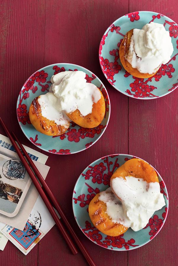 Spicy Grilled Peaches With Cream Photograph by Veronika Studer