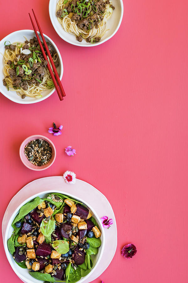 Spicy Ostrich Dan-dan Noodles, Blueberry-and-beetroot Salad With Crispy Tofu And Mixed Seeds Photograph by Great Stock!