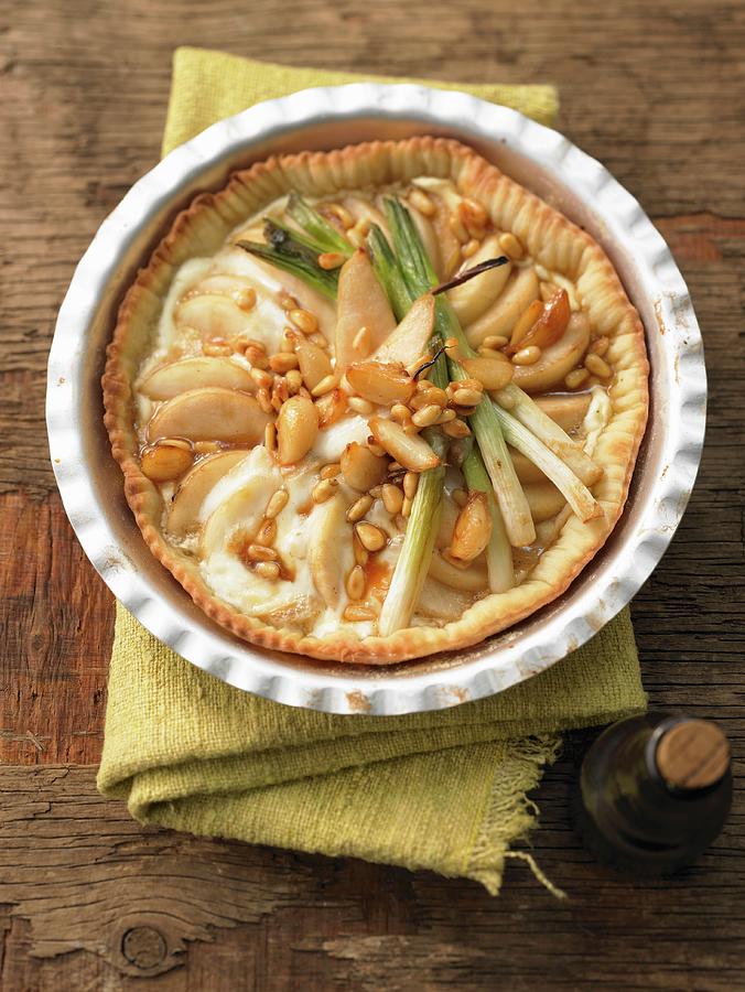 Spicy Pear Tart With Candied Garlic Photograph by Jan-peter Westermann