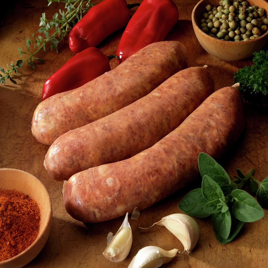 Spicy Pork Sausage With Peppers, Garlic, Herbs And Spices Photograph by Paul Poplis