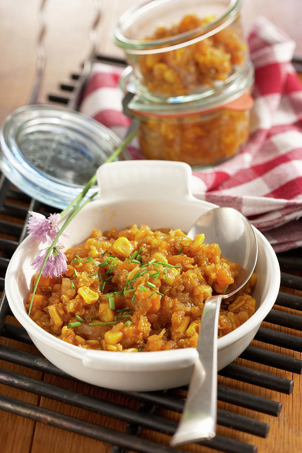 Spicy Pumpkin Relish In A Dish And In Jars Photograph by Teubner Foodfoto