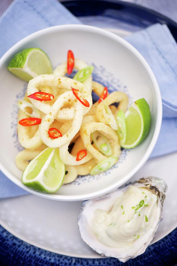 Spicy Squid Rings With Aioli And Limes Photograph by Winfried Heinze