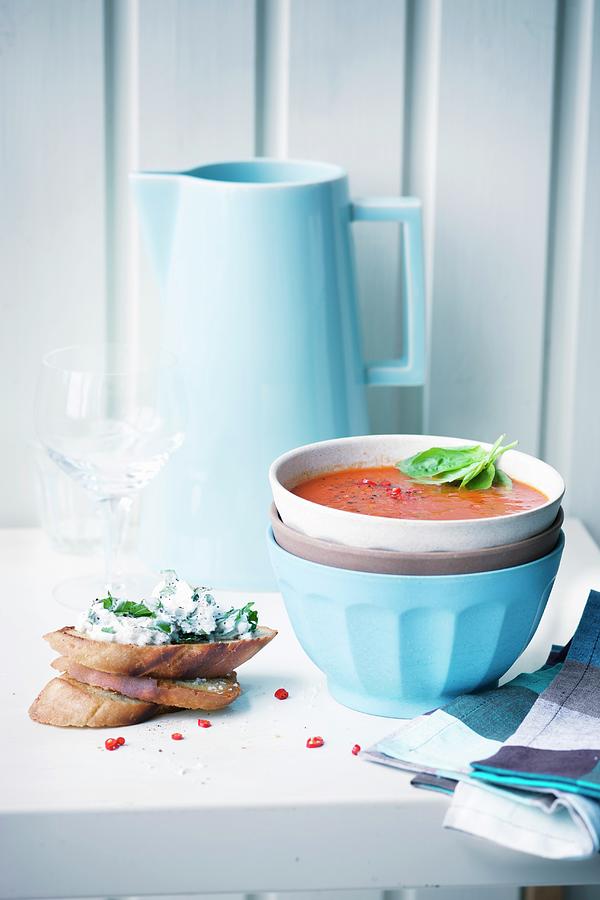 Spicy Tomato Soup With Grilled Bread In A Soup Bowl Served With Bread And Cream Cheese Photograph by Jalag / Wolfgang Schardt