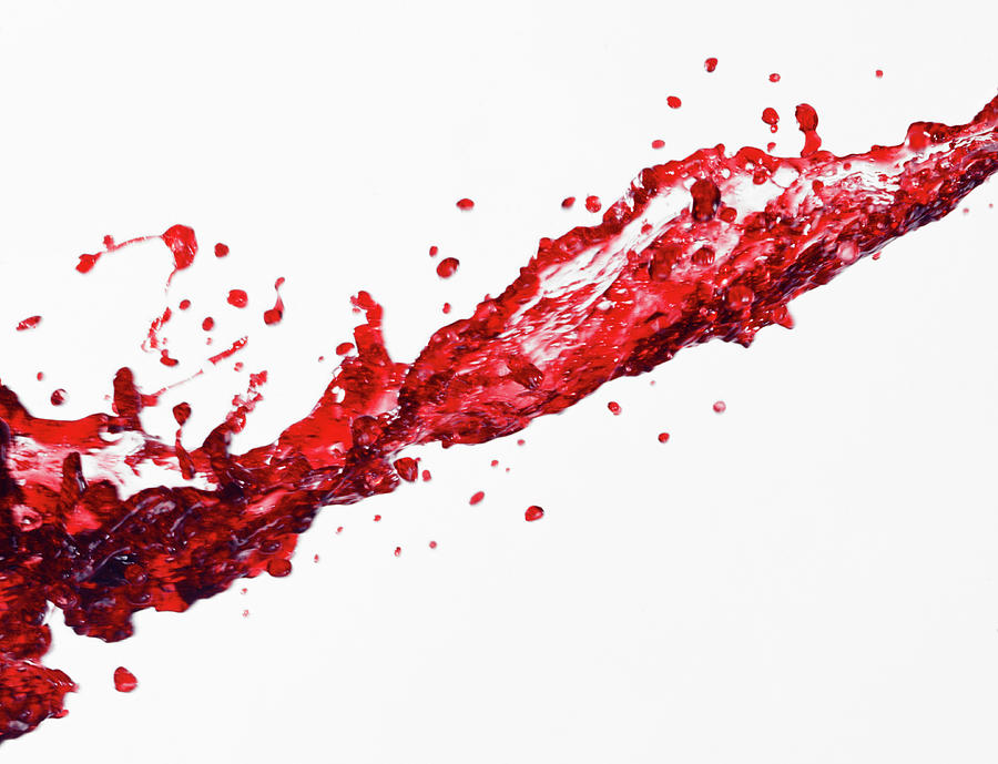 Spilt Red Wine Photograph by Peter Dazeley