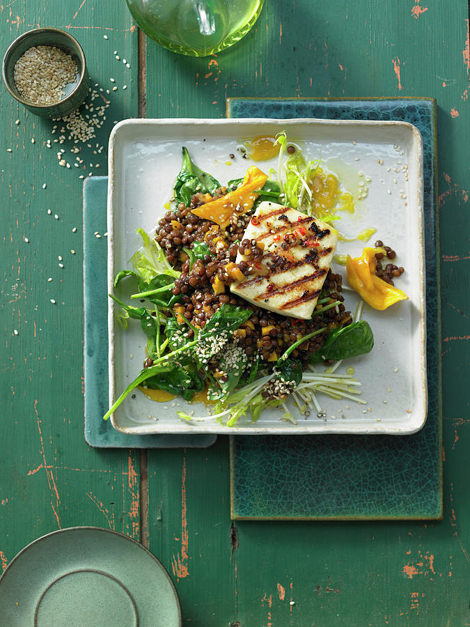 Spinach And Lentil Salad With Dried Mango, Sesame Seeds And Grilled Halloumi Photograph by Jan-peter Westermann