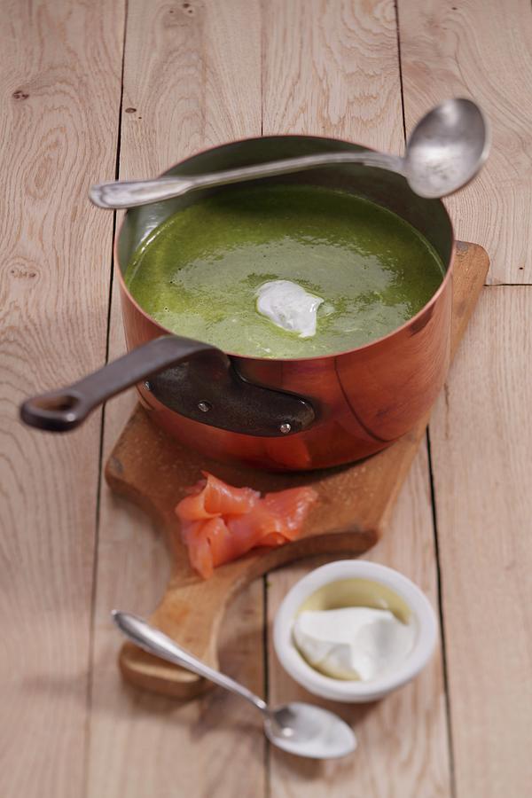 Spinach Curry Soup With Smoked Salmon And Creme Fraiche Photograph by Frank Weymann