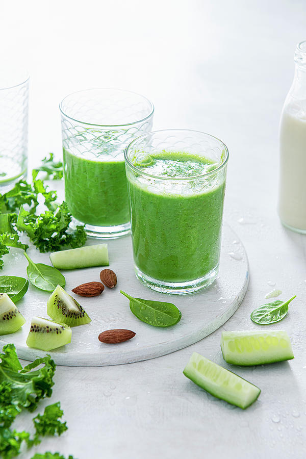 Spinach, Kale And Cucumber Smoothie With Kiwi And Almond Milk Photograph by Magdalena Hendey