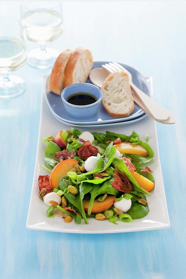 Spinach, Peach And Mozzarella Salad With Bacon Photograph by Peter Kooijman