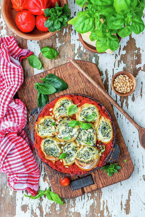 Spinach Rotolo Baked In Tomato Sause Photograph by Irina Meliukh