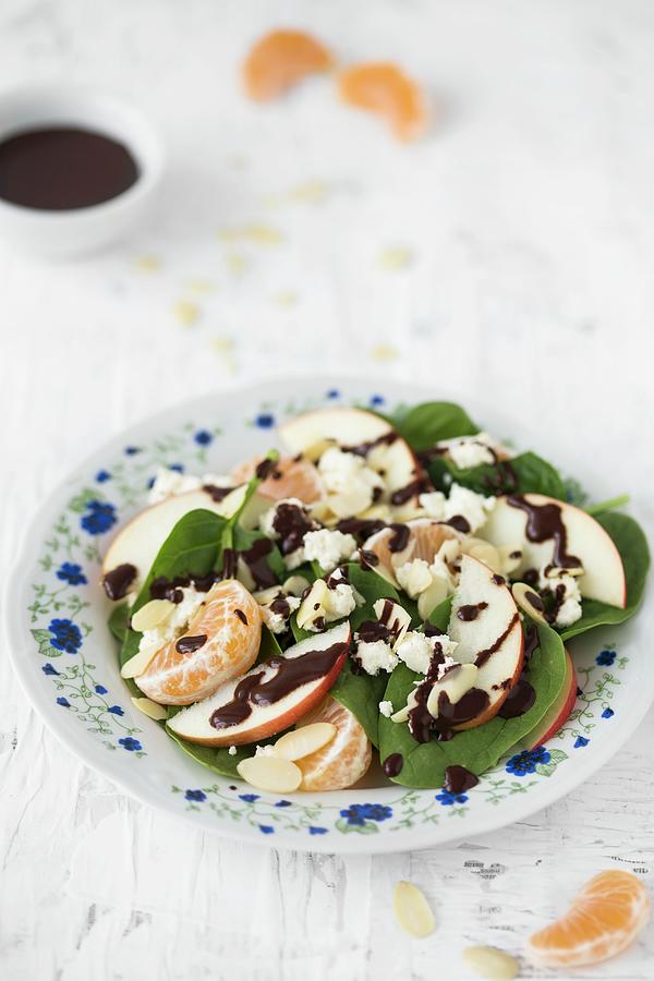 Spinach Salad With Apples, Mandarins; Goats Cheese And Almond And Chocolate Vinaigrette Photograph by Malgorzata Laniak