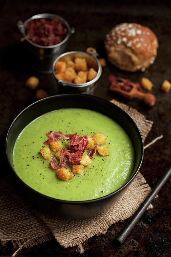 Spinach Soup With Celery, Croutons And Bacon Strips Photograph by Jane Saunders