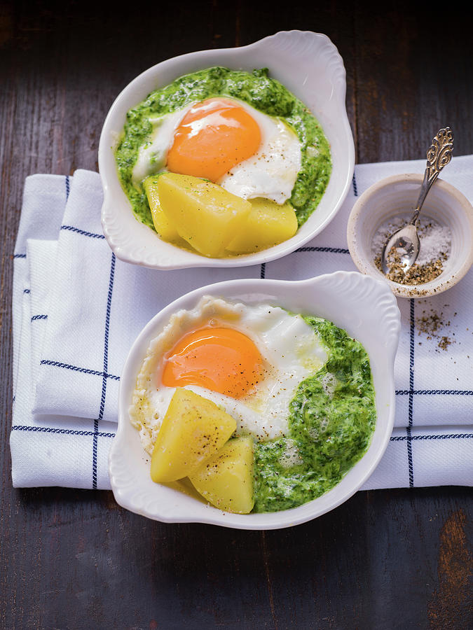 Spinach With Fried Egg And Boiled Potatoes Photograph by Eising Studio